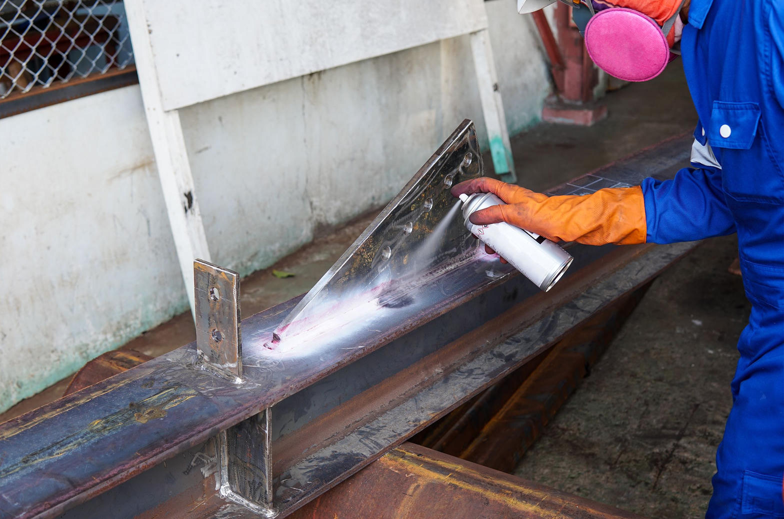 Liquid penetrant applied to welded components.